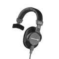 Black single-sided wired over-ear headphone with padded headband and fabric-covered ear cushion, labeled beyerdynamic.