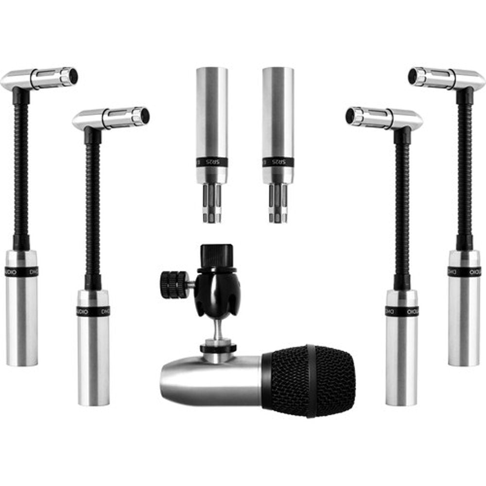 Set of six small silver microphones including gooseneck types and two standalone cylindrical elements, plus one larger microphone with grille and mount.
