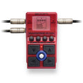 Red Zoom MultiStomp MS-60B+ multi-effects pedal with screen, knobs, footswitches, and audio cables connected.