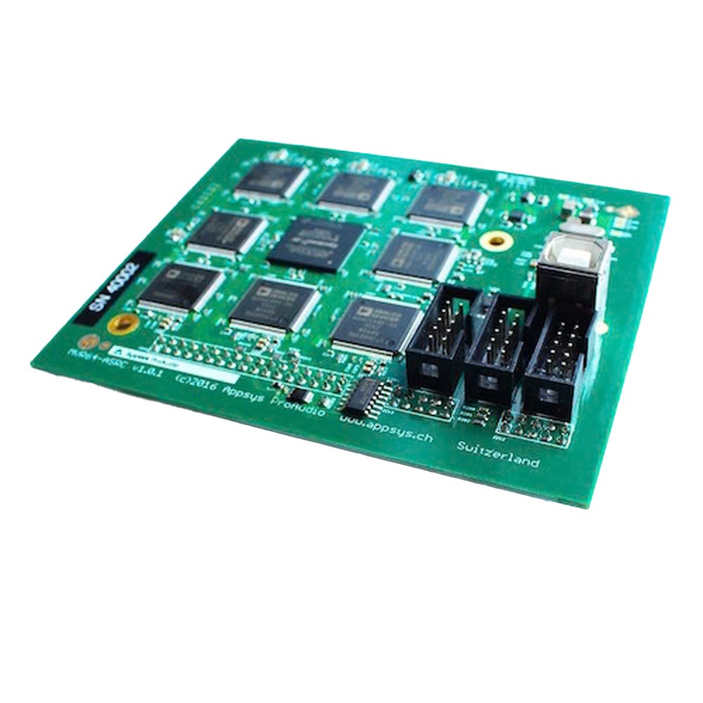Green circuit board with multiple integrated chips and three black connectors including a fiber optic port.