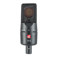 Black studio microphone with metal mesh grille and XLR connector shown from front view.