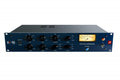 Front panel of a blue rackmount audio compressor with multiple knobs, switches, and a VU meter display.