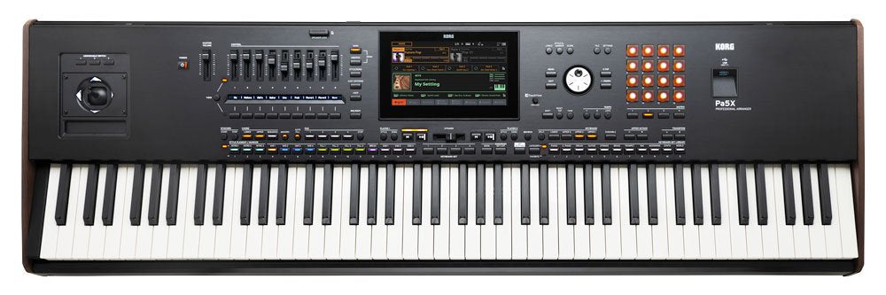 Black KORG Pa5X keyboard synthesizer with multiple keys, sliders, buttons, a joystick, and a color display screen.