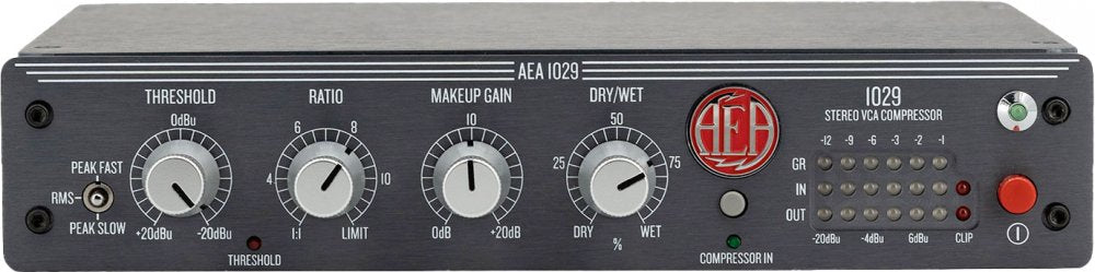 Front panel of an AEA 1029 stereo VCA compressor with knobs, indicator lights, and push buttons.