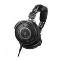 Black open-back over-ear wired headphones with padded headband and mesh ear cups labeled L and audio-technica ATH-R50x.