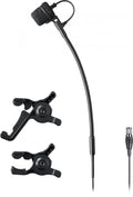 Black microphone with foam windscreen, flexible arm, two black mounting clips, and multi-pin circular connector cable.