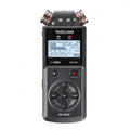 Front view of a Tascam DR-05XP portable audio recorder with built-in microphones and control buttons.