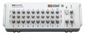 White audio cue mixer with multiple volume and pan knobs, dual headphone amps, and microphone controls.