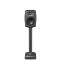 Black studio monitor speaker on a matching stand with visible Genelec logo on the front.