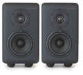 Pair of black studio monitors with large woofers and tweeters on front side.