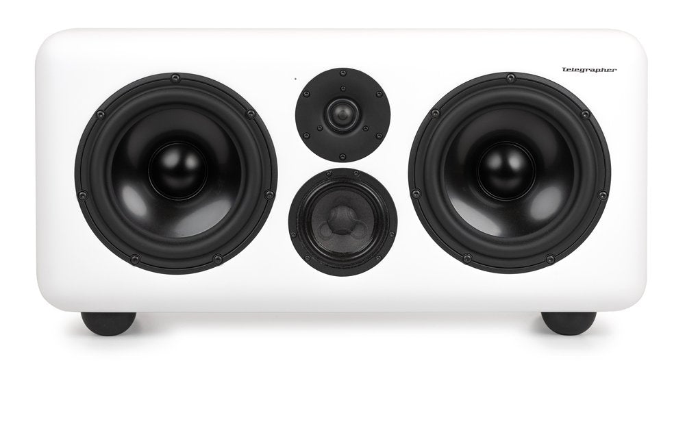Front view of a white studio monitor with two large woofers, one midrange driver, and one tweeter speaker in black.