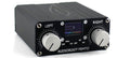 Black audio device with two large knobs labeled LEFT and RIGHT and a small screen in center showing a battery icon.