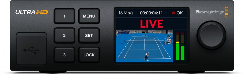 Front view of a Blackmagic Design video streaming device with buttons, USB port, screen showing live tennis match, and rotary knob.