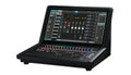 Waves eMotion LV1 Classic compact desktop digital mixing console with an angled 21.5-inch touchscreen above a row of 17 motorized faders, rotary encoders, and toggle switches.