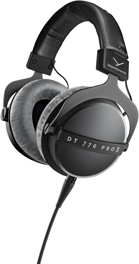 Black over-ear wired headphones with gray ear cushions and text DT 770 PRO X on the ear cup.