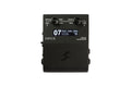 Black rectangular amp simulator device with a screen, two rotary knobs, and side audio jacks.