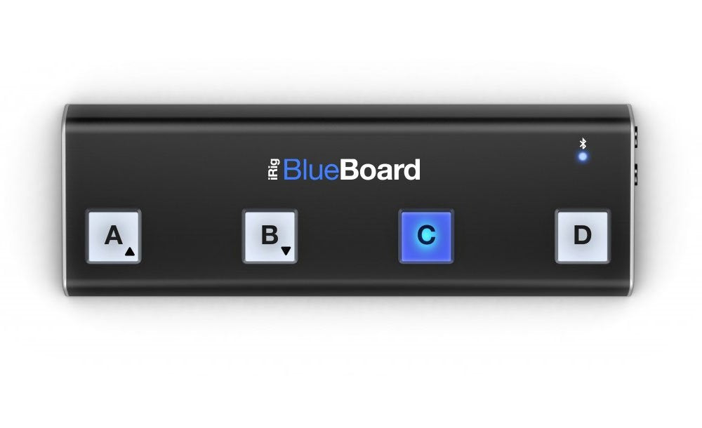 Black rectangular device with four square buttons labeled A, B, C, D and a blue LED near the top right.