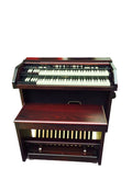 Hammond A-162 console organ with two waterfall manuals, harmonic drawbars, reverse-color preset keys, and a detachable 25-note pedalboard in a compact wooden console cabinet.