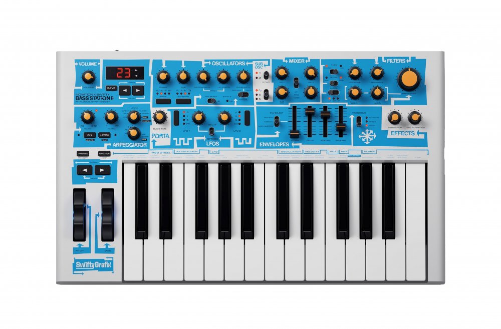 Compact keyboard synthesizer with knobs, sliders, buttons, wheels, and a small digital display on a blue and white panel.