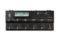 Black KEMPER Profiler pedalboard with multiple footswitches, knobs, and a display labeled Atomic Punch.