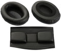 Two oval black leatherette ear pads and one rectangular headband pad for headphones shown on white background.