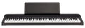 Black electronic keyboard piano with white and black keys and a music stand attached.