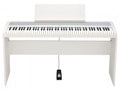 White digital piano keyboard with stand, music rest, and sustain pedal connected by a cable.
