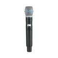 Black handheld wireless microphone with silver mesh grille and digital display showing frequency and battery level.