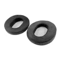 A pair of black suede oval replacement eartip pads with mesh centers for headphones.