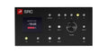 Black monitor controller with a screen displaying volume -18 dB, multiple buttons and a volume rotary knob.