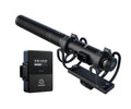 Black shotgun microphone mounted in shock mount with a small black wireless receiver unit labeled ATOMOS.