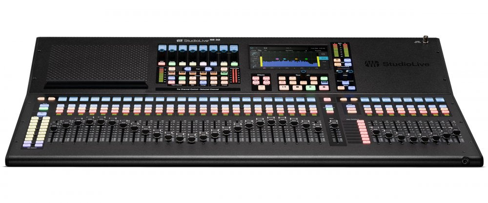 Black audio mixer console with 32 motorized faders, control buttons, rotary knobs, and a touchscreen display.
