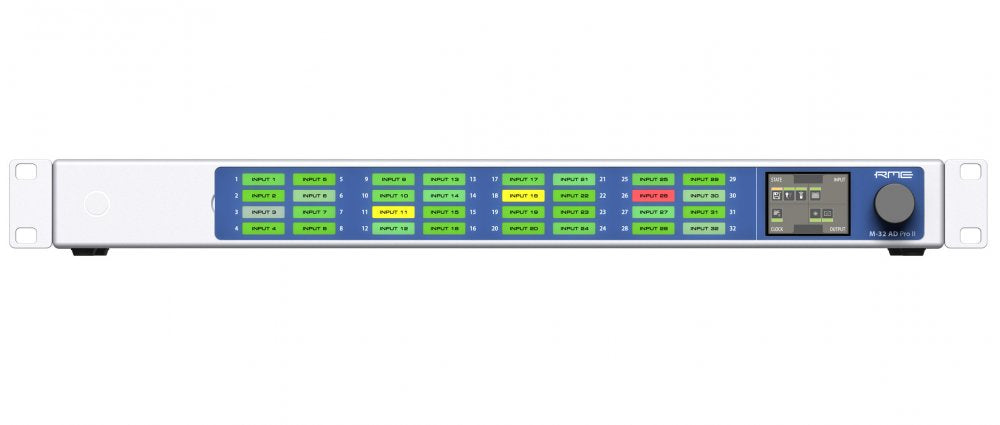Front panel of an audio interface with 32 labeled input indicators, a rotary knob, and a small color display screen.