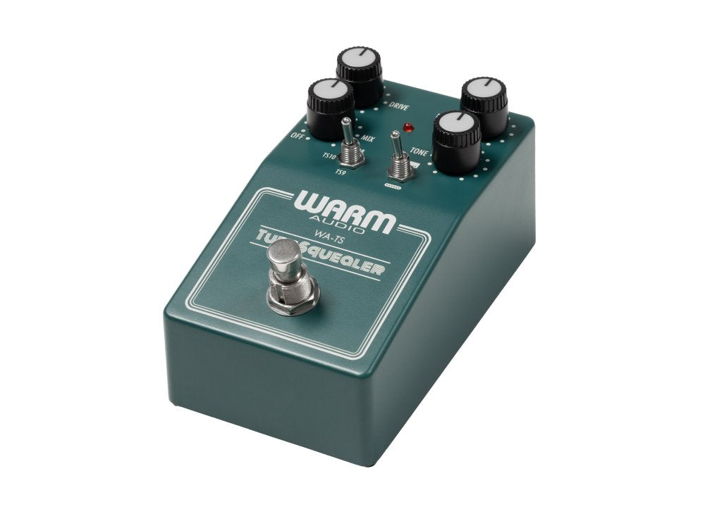 Green guitar effects pedal with knobs, toggle switches, and a footswitch labeled Warm Audio Tube Squealer WA-TS.