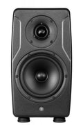 Black studio monitor speaker with two drivers and a textured front panel.