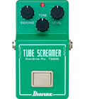 Green guitar effects pedal with three knobs, one footswitch, and labeled input/output jacks.