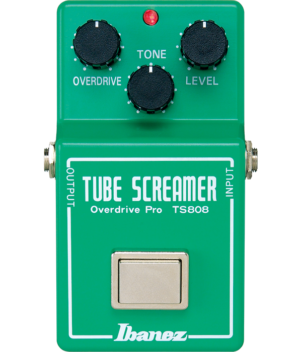Green guitar effects pedal with three knobs, one footswitch, and labeled input/output jacks.