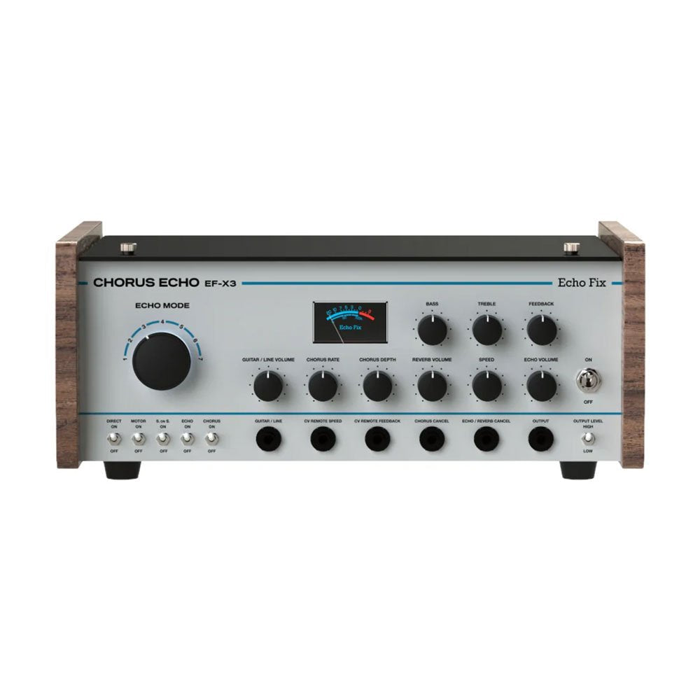 Silver and black audio effects unit with wood sides, rotary knobs, toggle switches, and 1/4 inch jacks on the front panel.