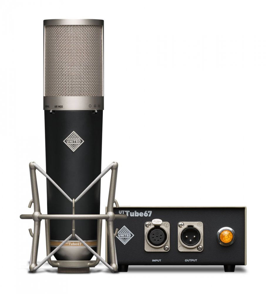 Black and silver microphone with shock mount alongside a black power supply unit with input, output connectors, and an amber light.