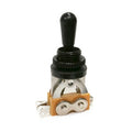 Black toggle switch with a black tip and metal solder lugs on a beige base.