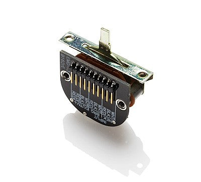 Close-up image of a 3-position toggle switch with solder lugs and printed text on a black plastic base.