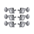 Set of six chrome guitar machine heads with kidney shaped tuning pegs in a 3+3 arrangement.