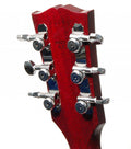 Rear view of a red guitar headstock with six chrome tuning pegs arranged 3+3.