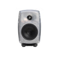 Front view of a silver studio monitor speaker with two drivers and a small indicator light on a black stand.