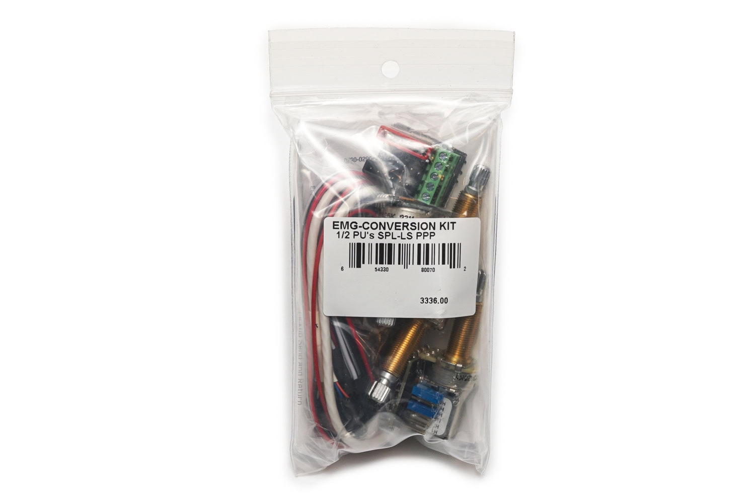 Plastic bag containing a guitar pickup conversion kit with potentiometers, wires, and a terminal block.