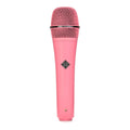 Pink handheld dynamic microphone with a mesh grille and TELEFUNKEN logo on the body.