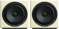 Front view of two ivory-colored AVANTONE studio monitor speakers with black speaker cones and silver rims.