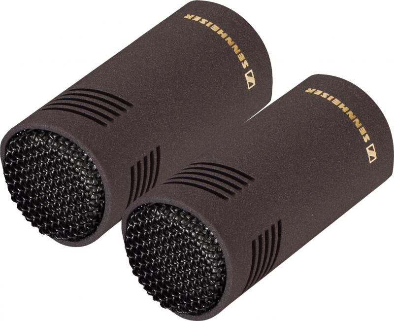 Two black cylindrical microphones with mesh fronts and SENNHEISER branding.