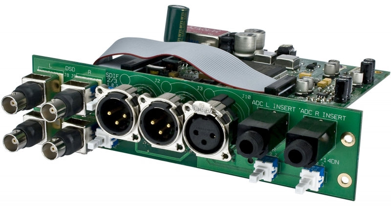 Green circuit board with six BNC connectors, three XLR connectors, two 1/4 inch TRS jacks, and a ribbon cable connector