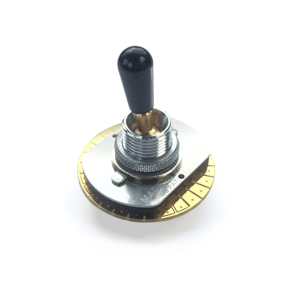 A single toggle switch with a black lever handle and a round metal base with gold contacts.